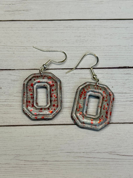 Gray O with Red Flakes