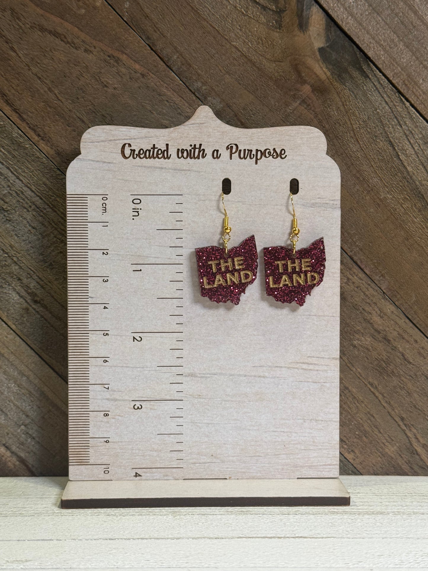 Maroon Glitter - The Land