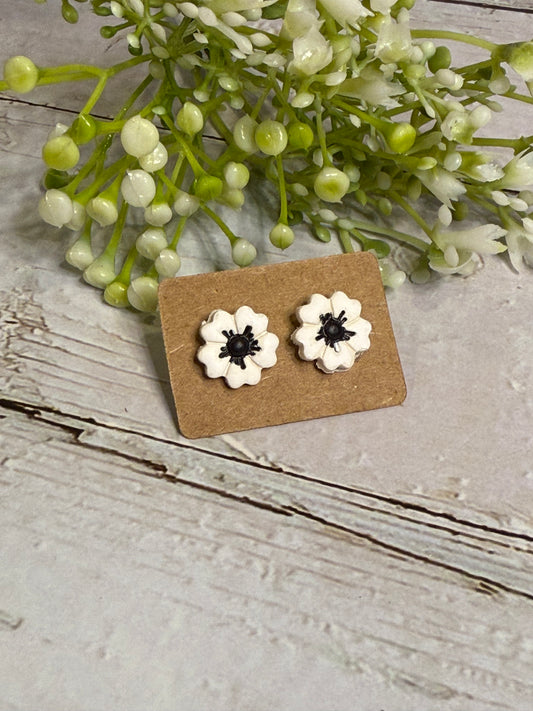 White Flower with Black Center