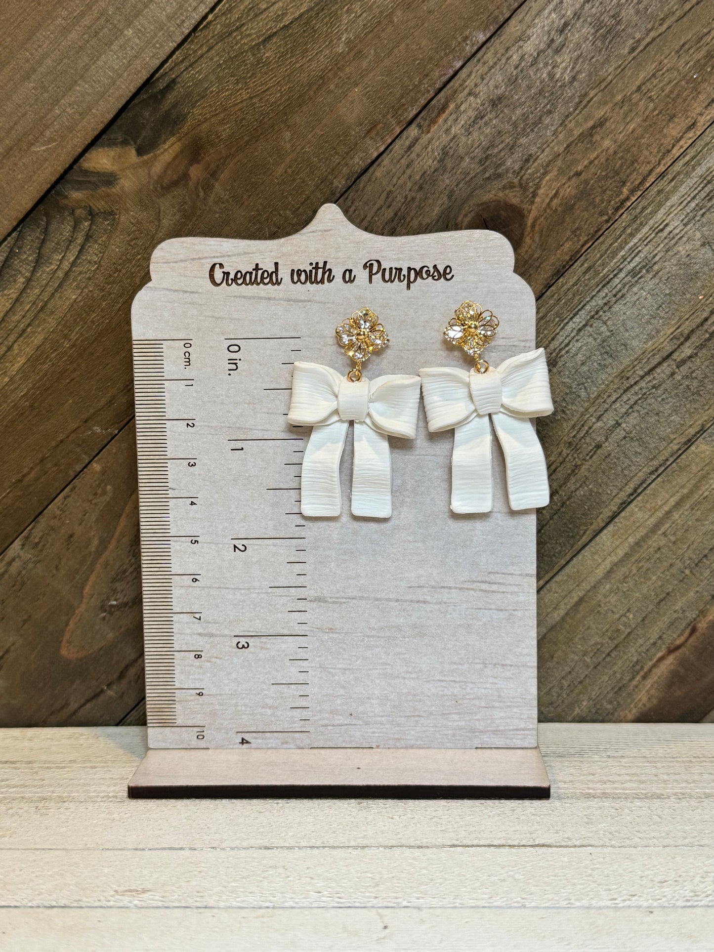 Textured White Bow with Rhinestone Top Earrings