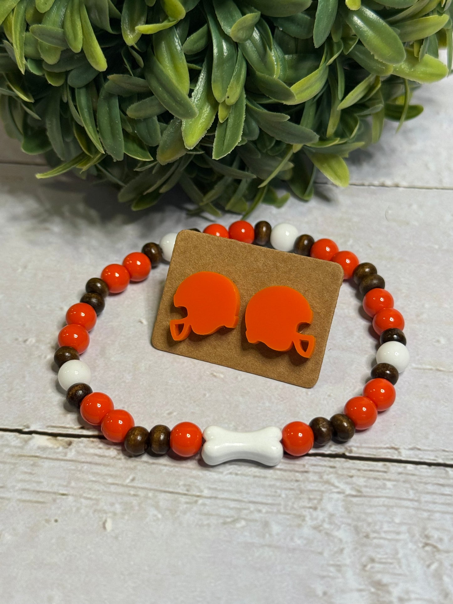 Bone with Orange and Brown Beads